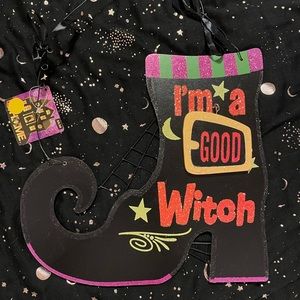 Good Witch Bad Witch? Black witch boot sign with reversible “Good” & “Bad” sign!